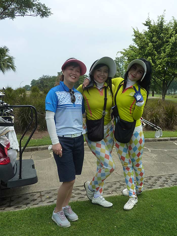 Ms. Vu from Vietnam Golf Magazine and her matching Caddies
