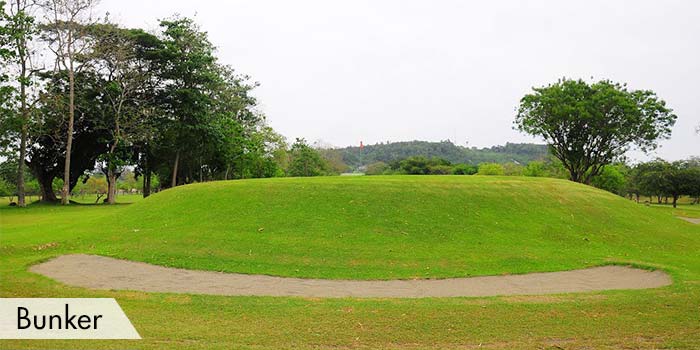 A Bunker in a Hole at Davao City Golf Club