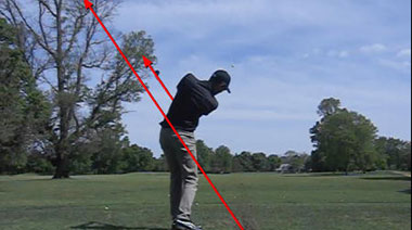 Here the golfer has allowed the club to swing through impact and into his finish as he pivots his body to face the target.