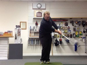 This is an example of the classic way to hit a short game shot that is taught to a lot of beginning golfers. This technique will lead to problems with clubhead manipulation in the stroke.